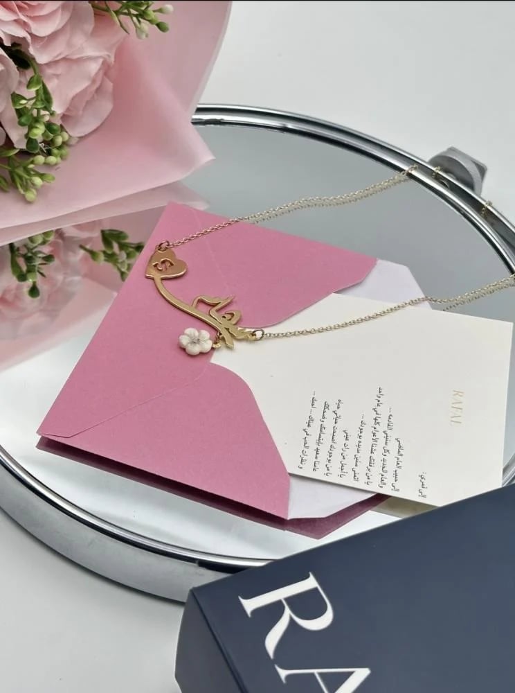 Name necklace with gold plated letter and elegant rose