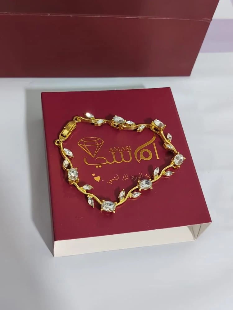 إسوارة غصن ذهبية مرصعة بفصوص زركون
