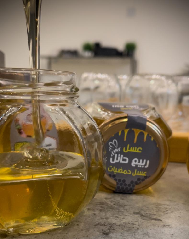 عسل حمضيات حجم نص كيلو
