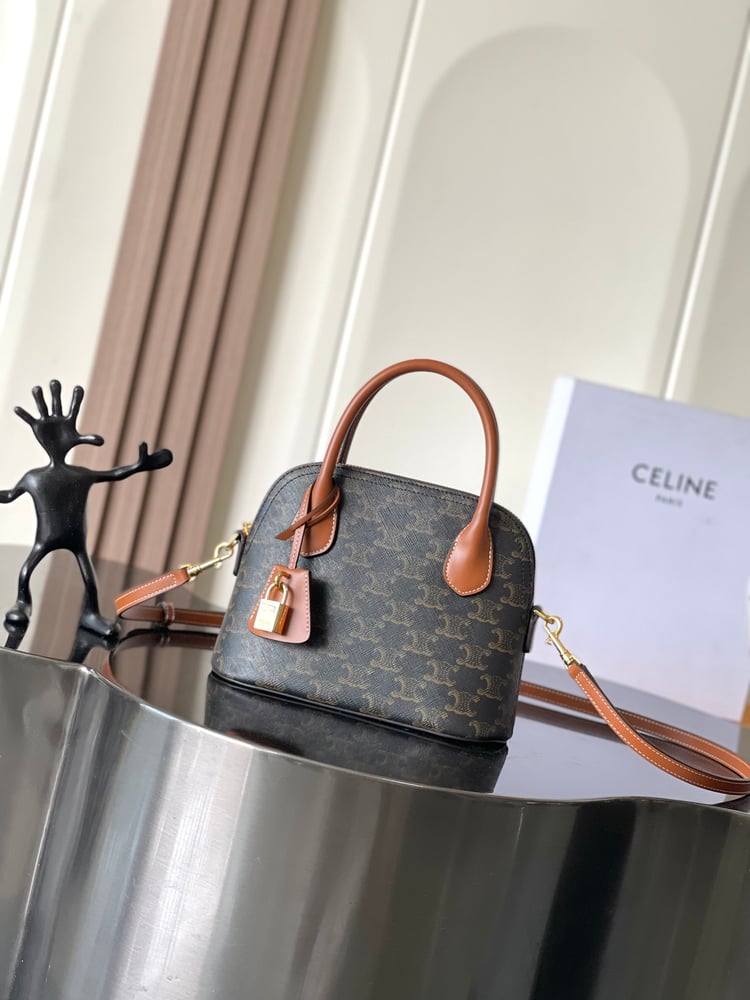 حقيبة صدفية جديدة من CELINE HONORINE بلون اسود\بني
