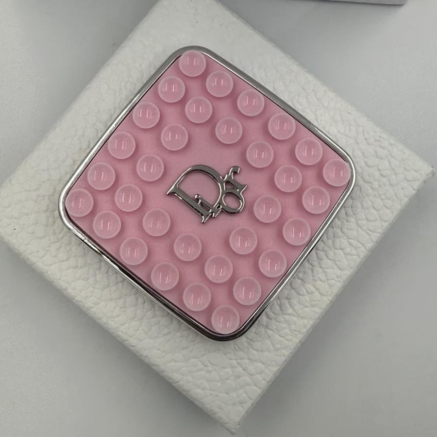 A mobile phone holder for Dior