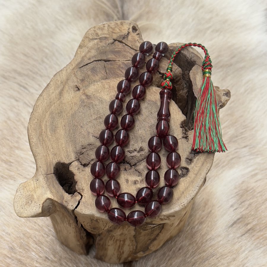 Saffron-colored rosary - a distinctive color
