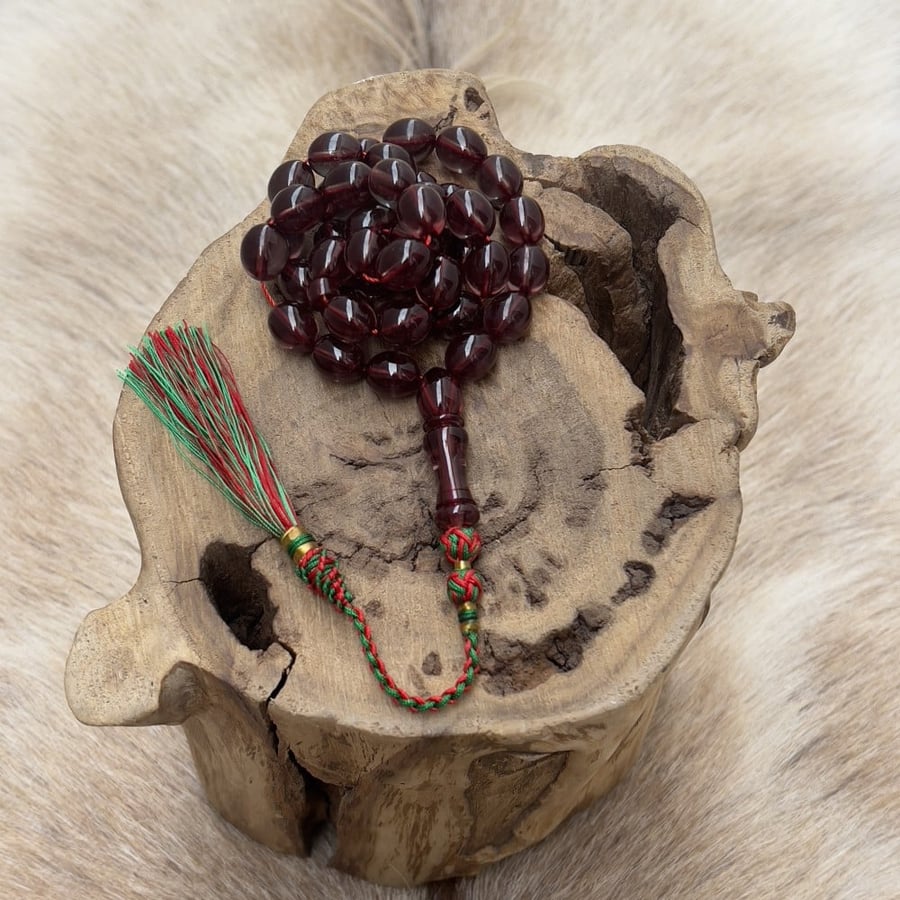 Saffron-colored rosary - a distinctive color