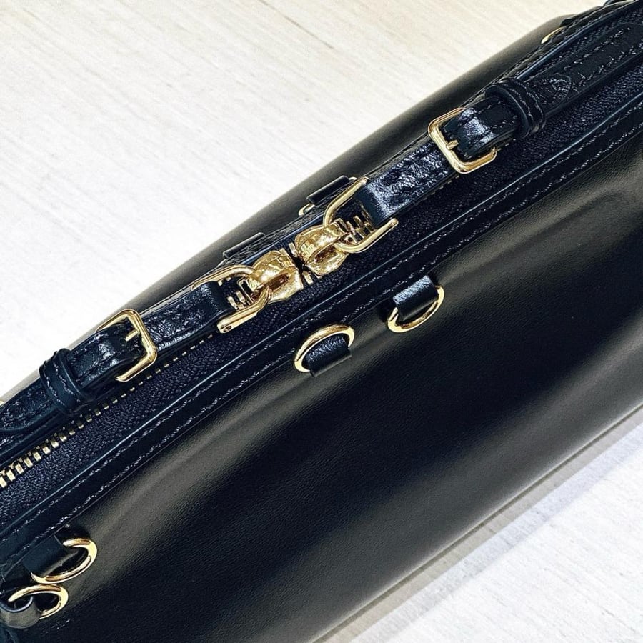 Caprice leather clutch bag