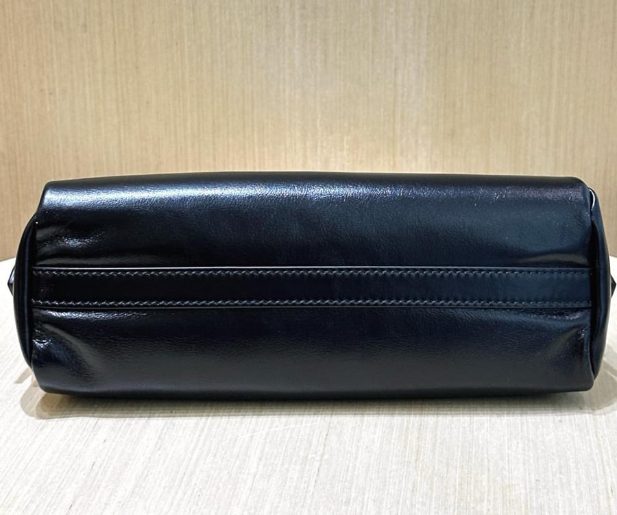 Caprice leather clutch bag