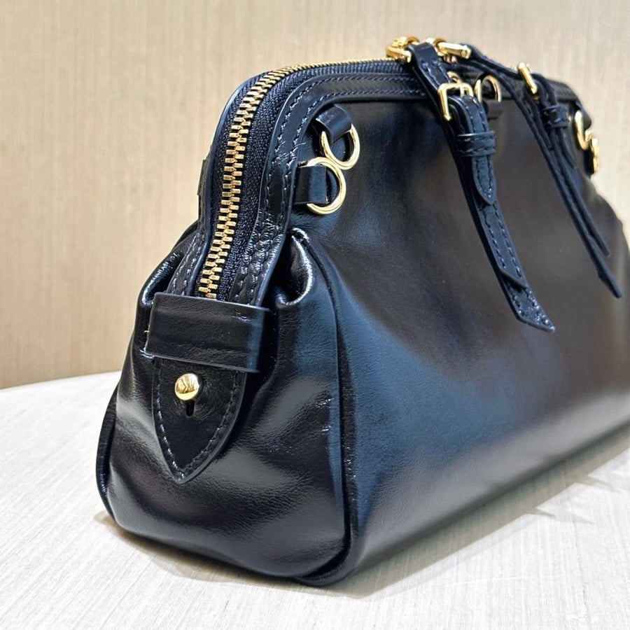 Caprice leather clutch bag