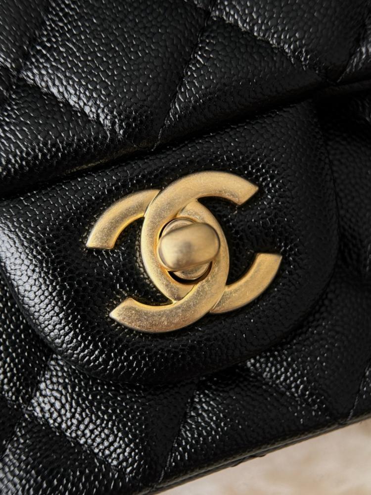 Chanel mini flap with top handle black color