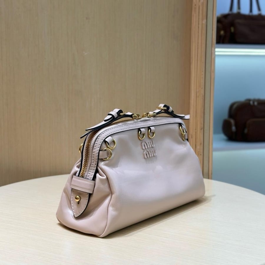 Caprice leather clutch bag