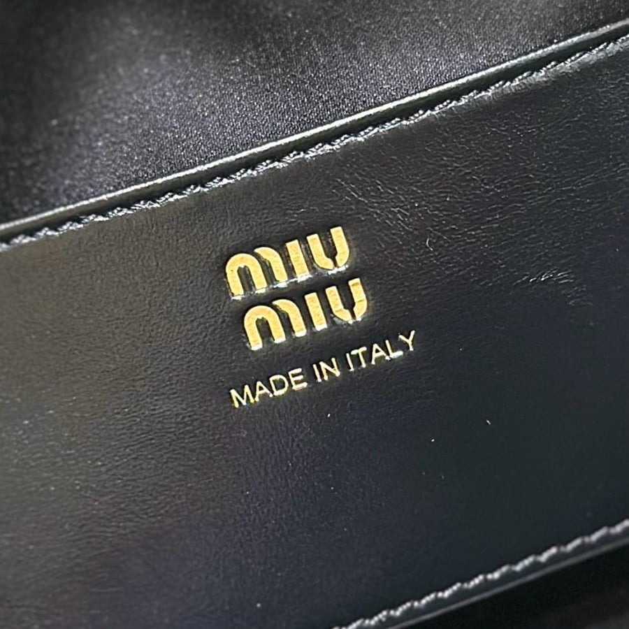 Caprice leather clutch bag