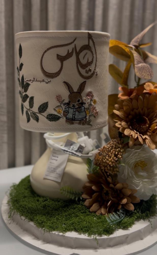 Embroidered lamp cover + flower arrangement