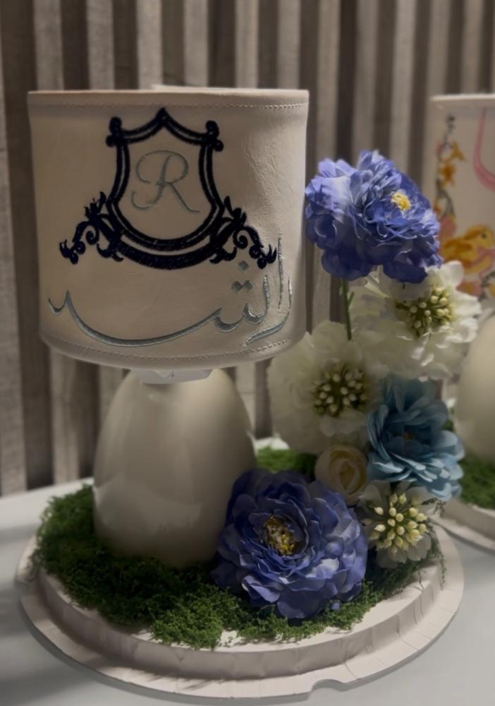 Embroidered lamp cover + flower arrangement