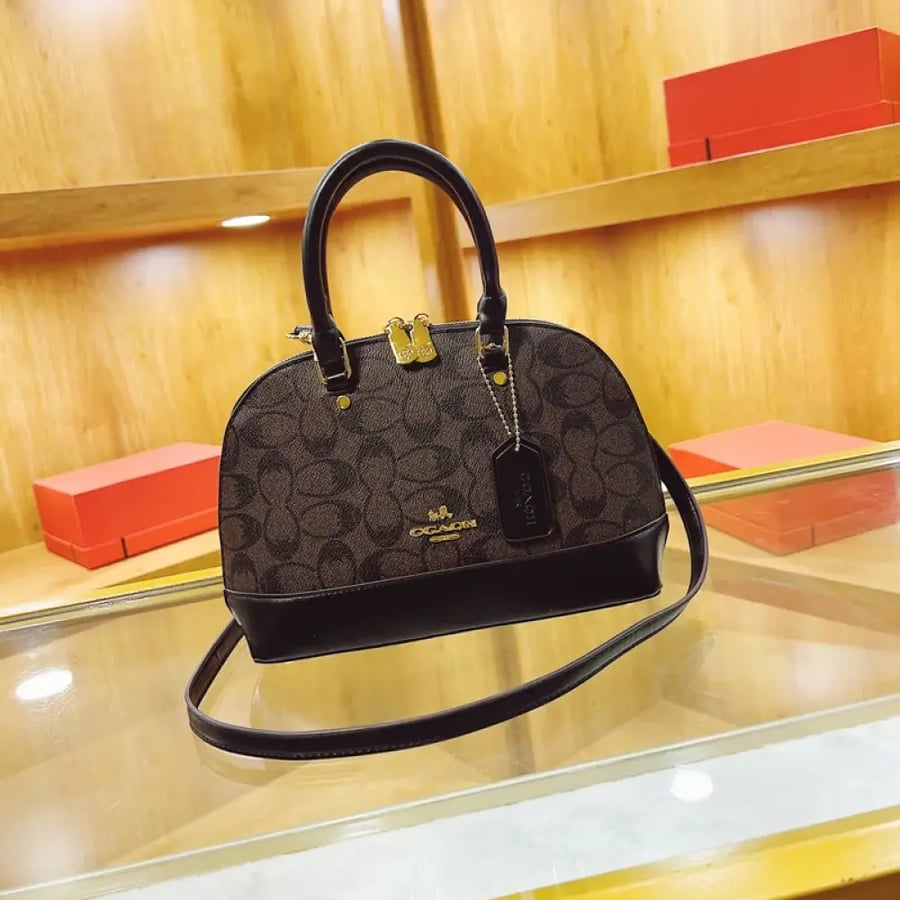 شنطة Coach