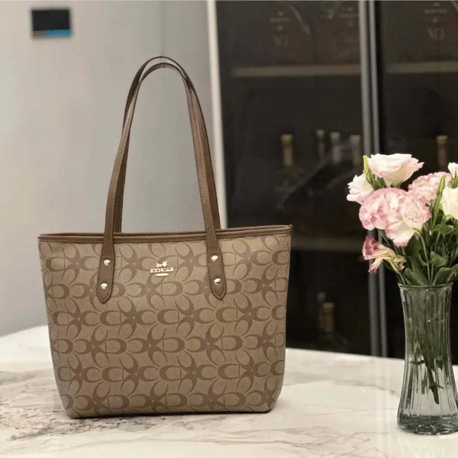 شنطة Coach