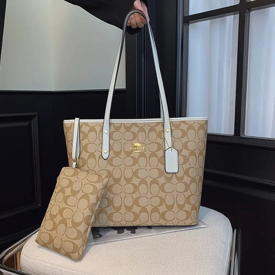 شنطة coach
