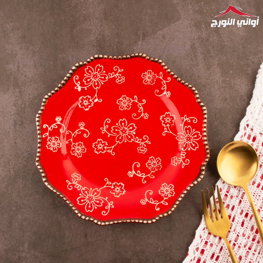 صحن أحمر مورد بالحبة