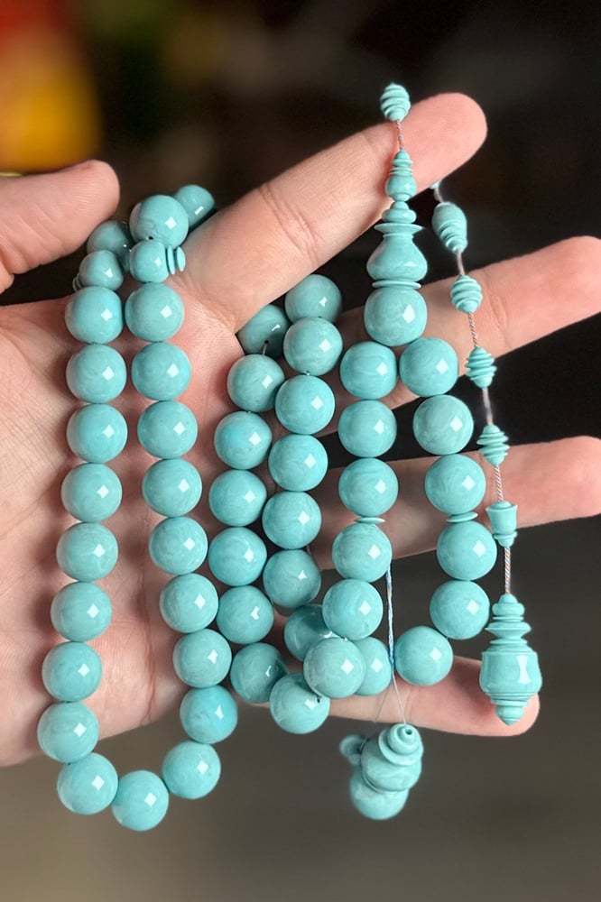 Turkish invoice, turquoise, round, كريم برعي