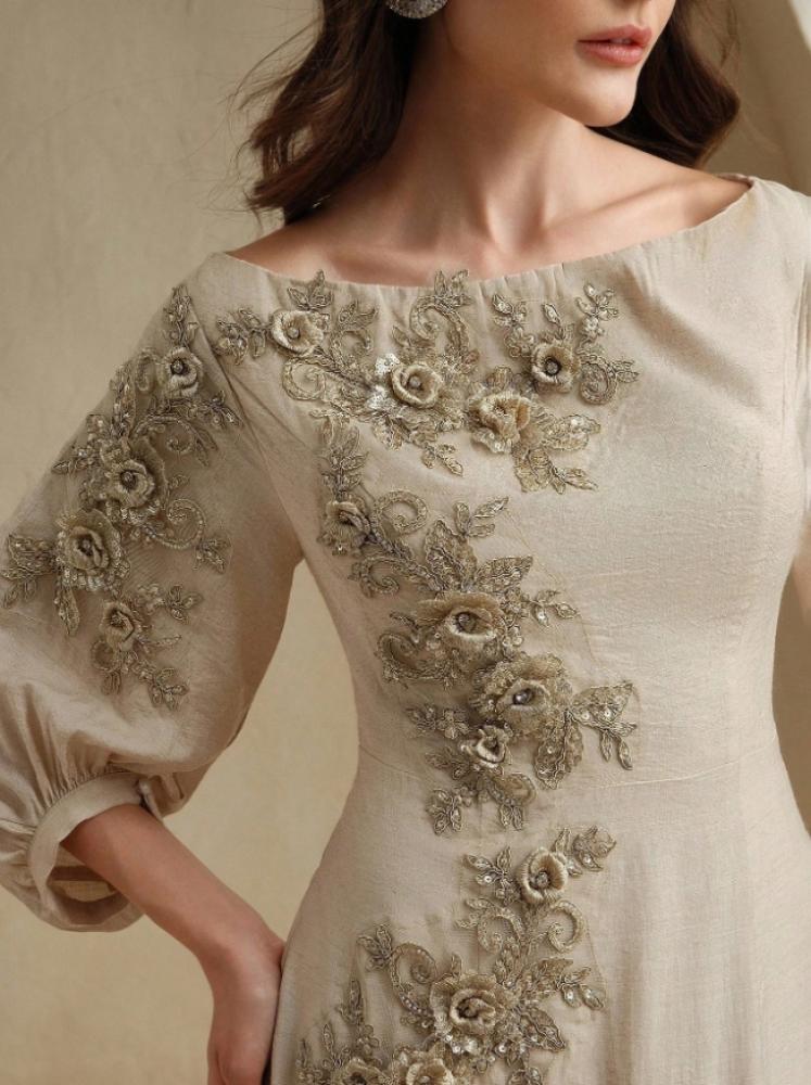 A revealing embroidered dress made of linen