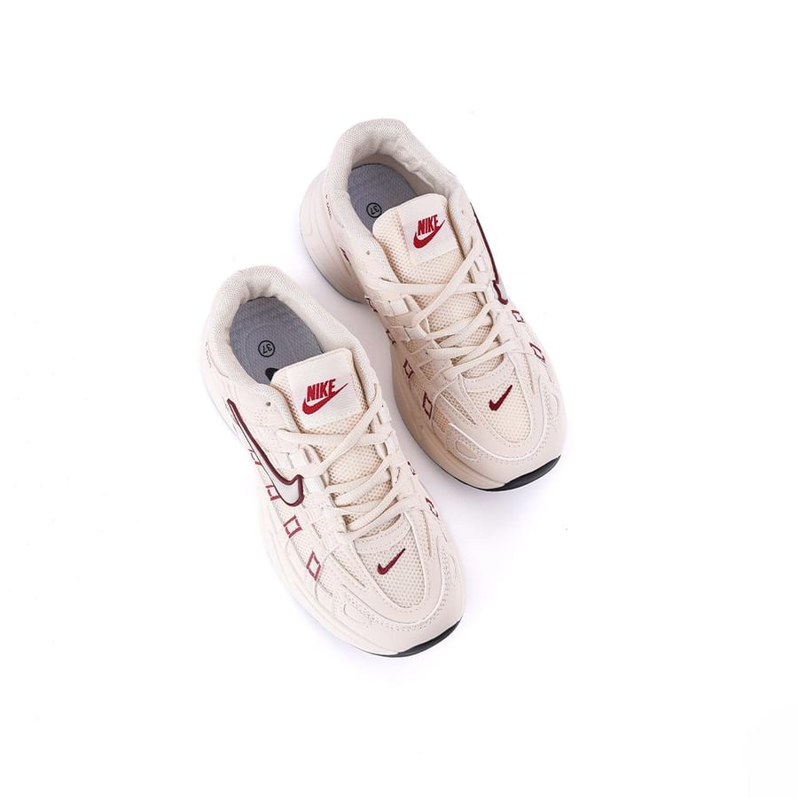 Nike women's beige shoe