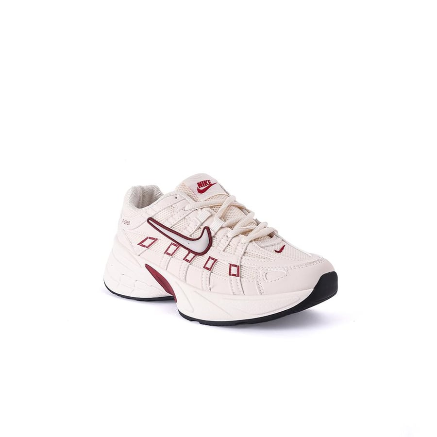 Nike women's beige shoe