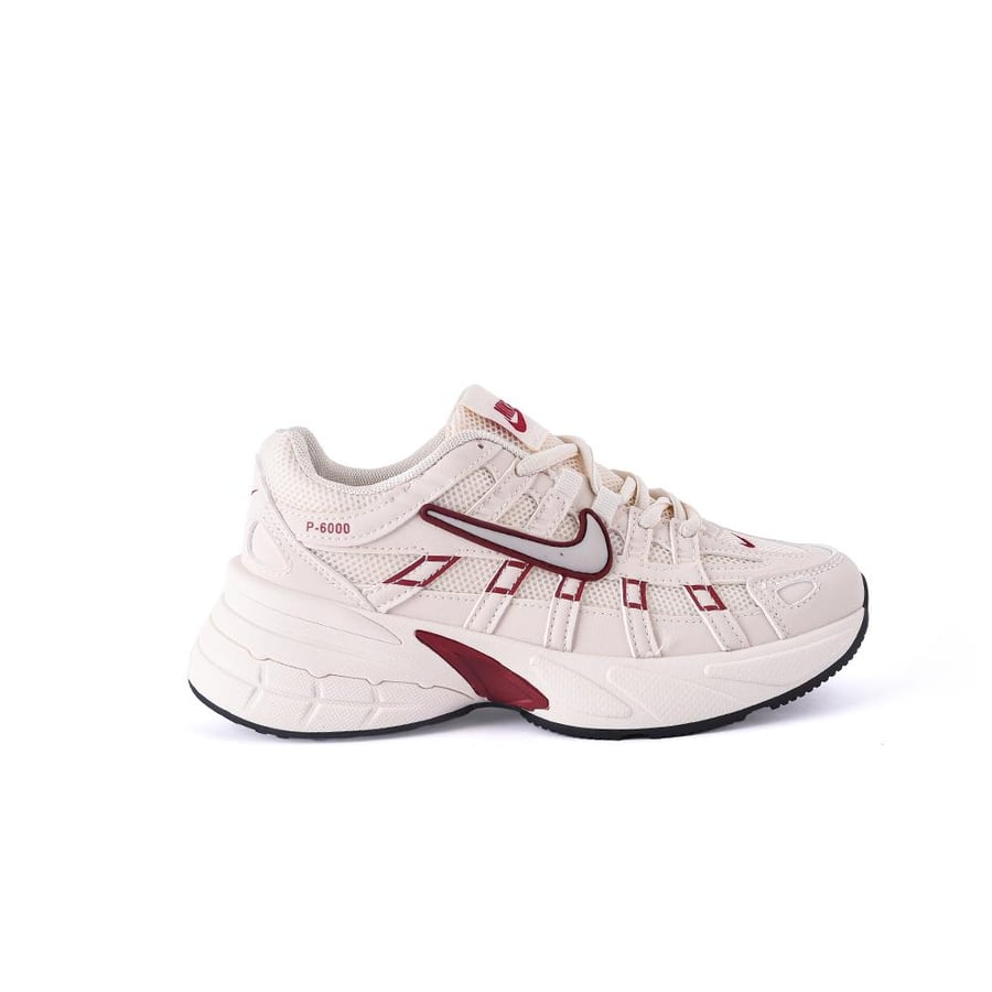 Nike women's beige shoe