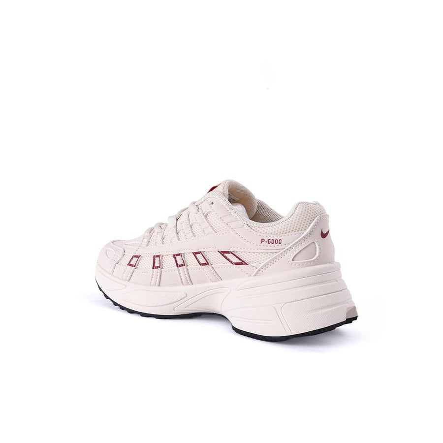 Nike women's beige shoe