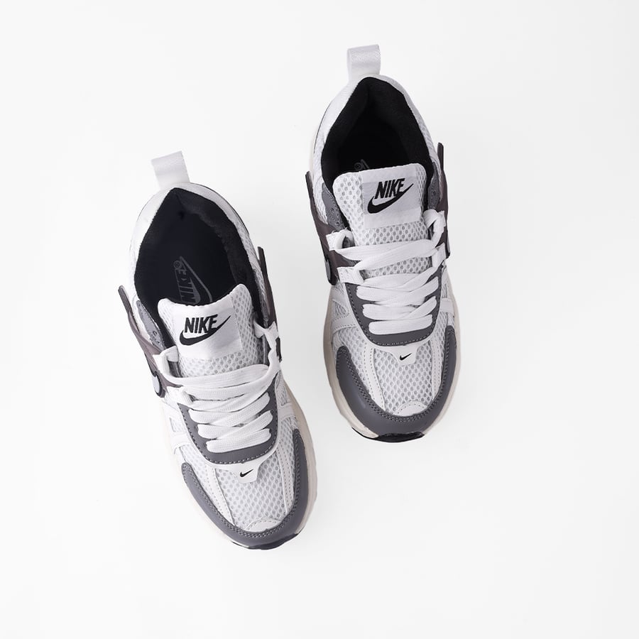 Nike white and gray women's shoe