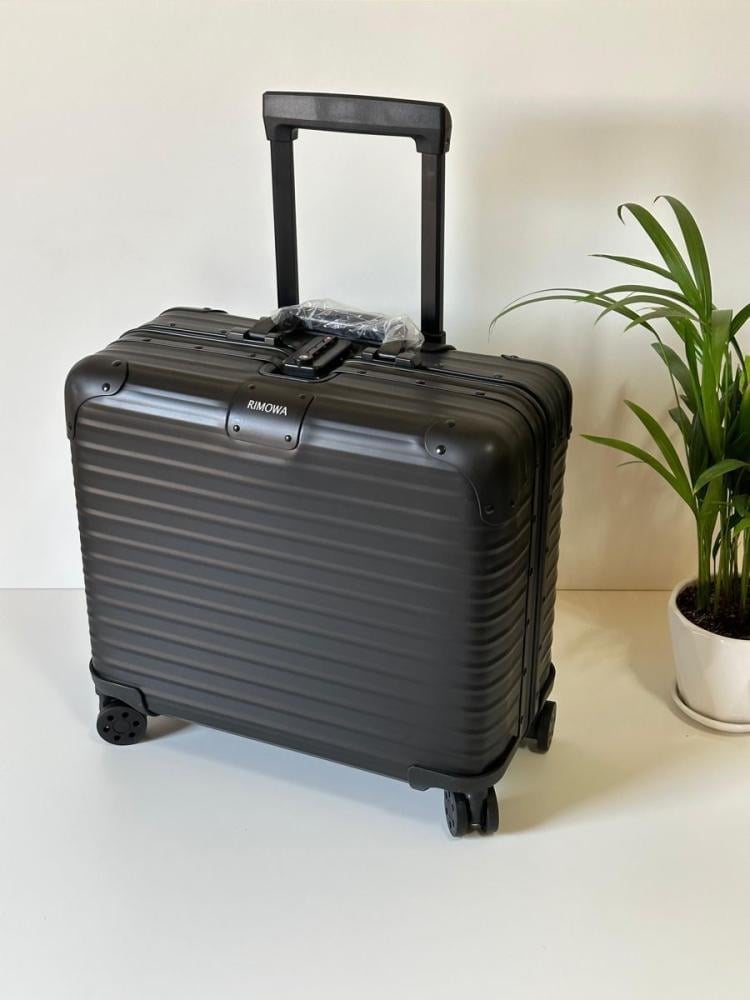 RIMOWA XS bag بعدة اللوان