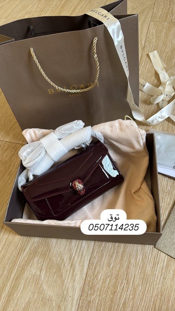 شنطة بولغاري عنابي لمعه