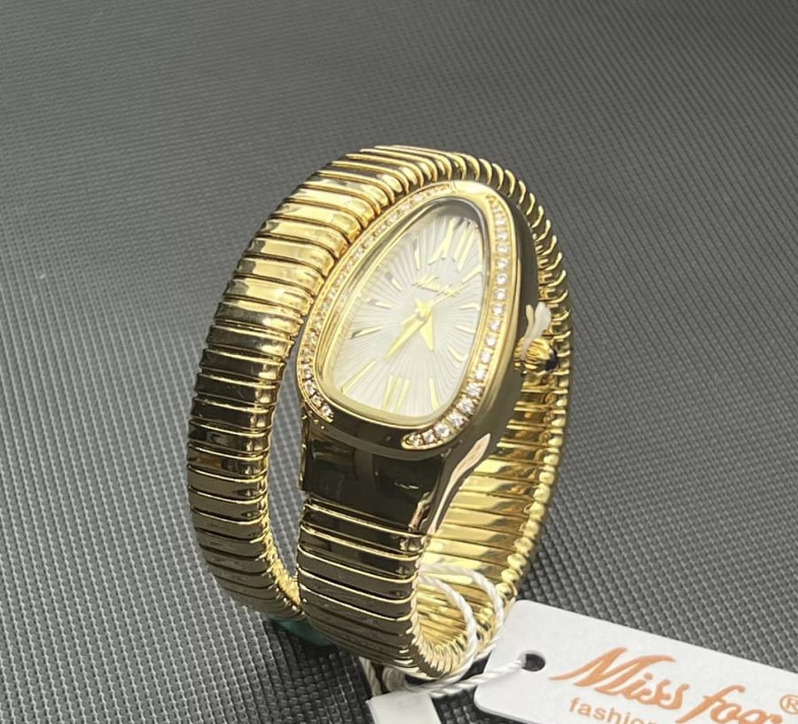 Dreams watch in gold color