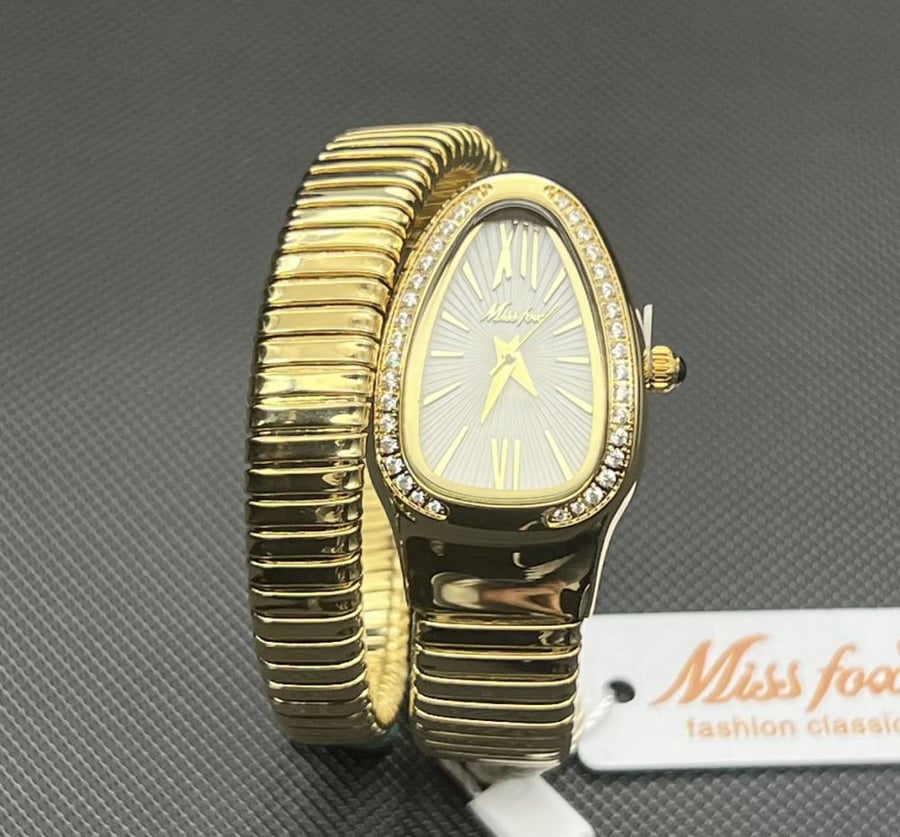 Dreams watch in gold color