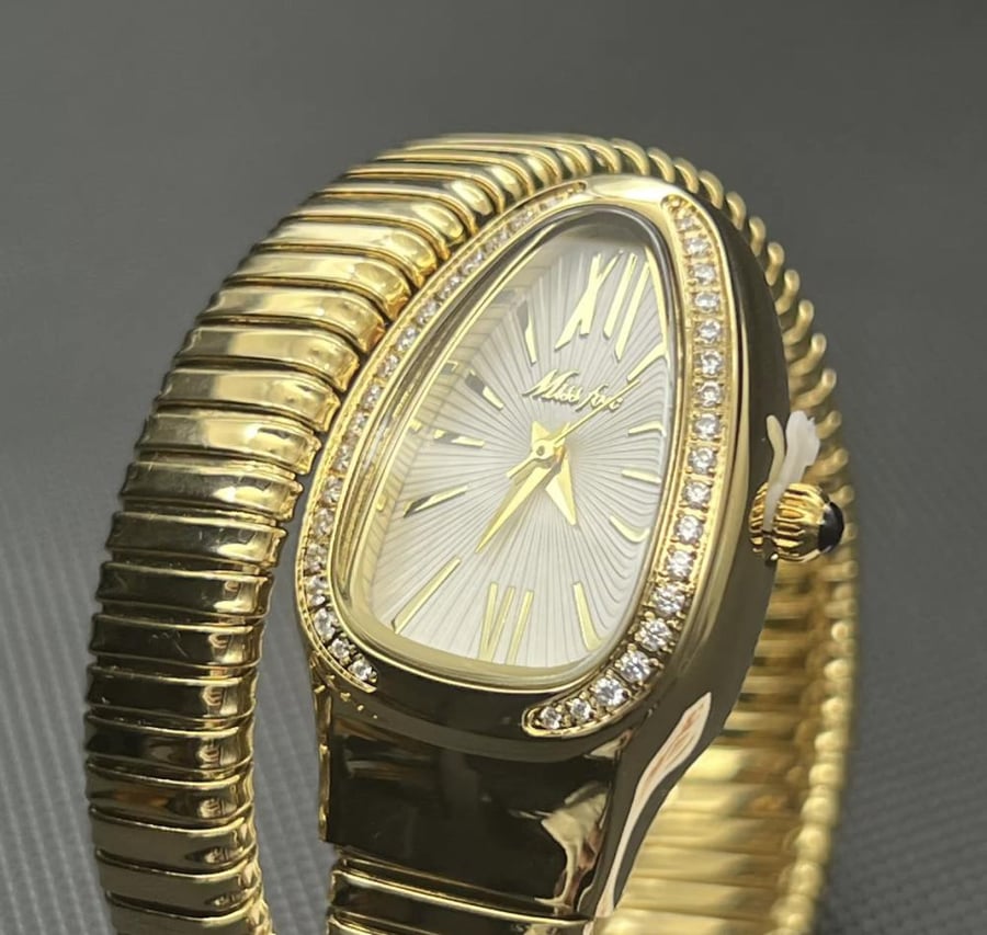 Dreams watch in gold color
