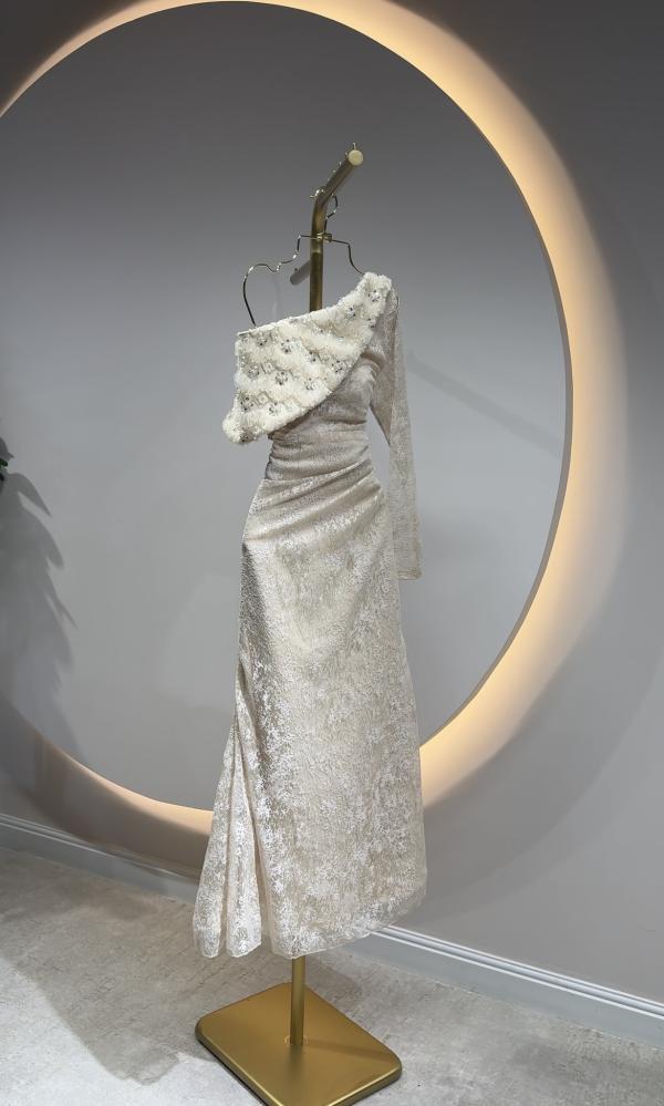 Long beige evening dress with one shoulder