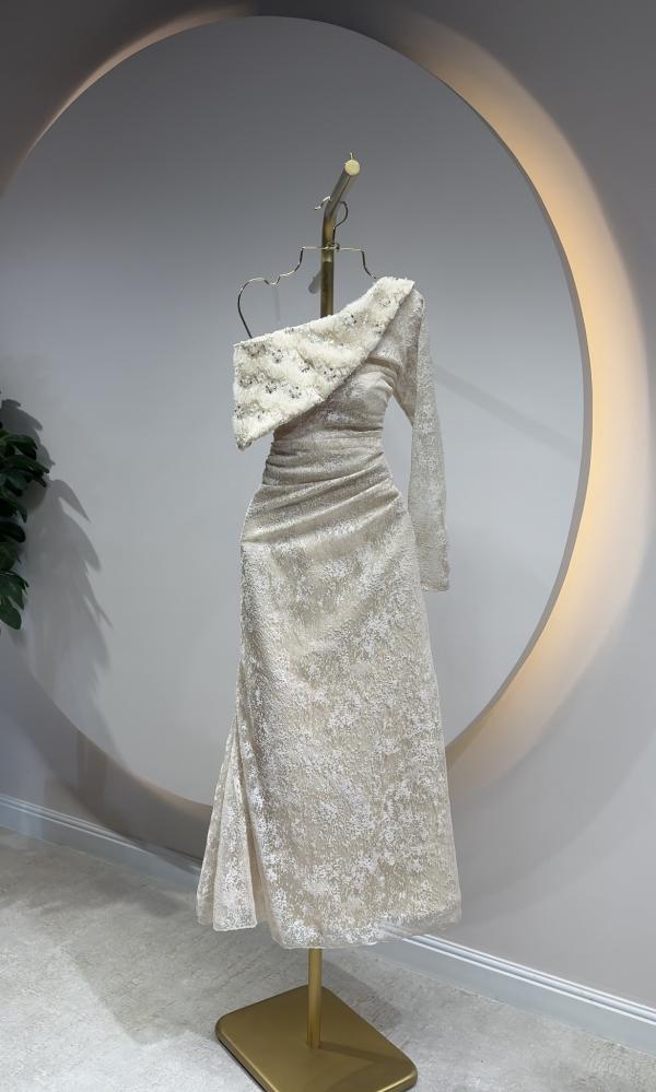 Long beige evening dress with one shoulder