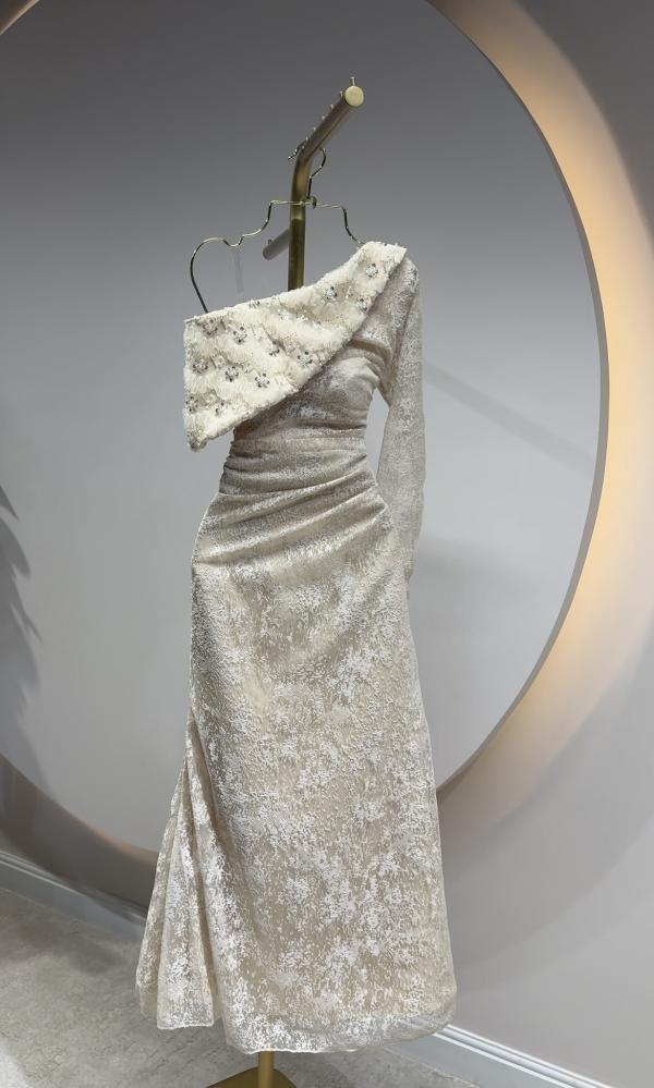 Long beige evening dress with one shoulder