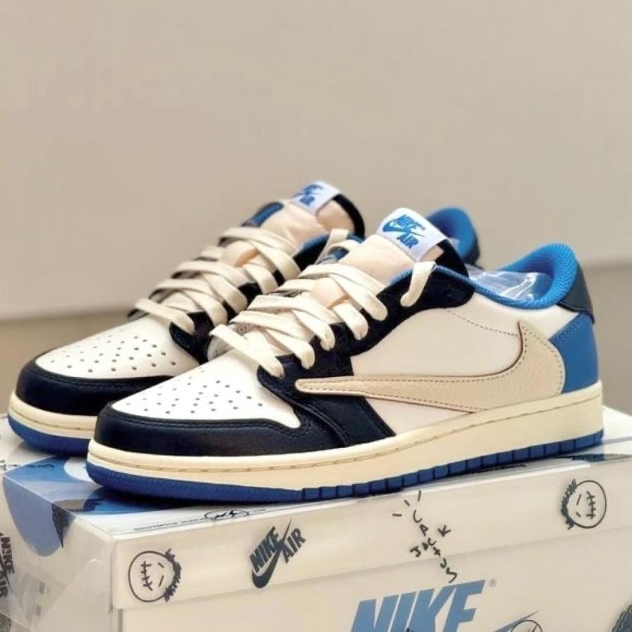 Jordan 1 Low - Black White Blue (UNC Style