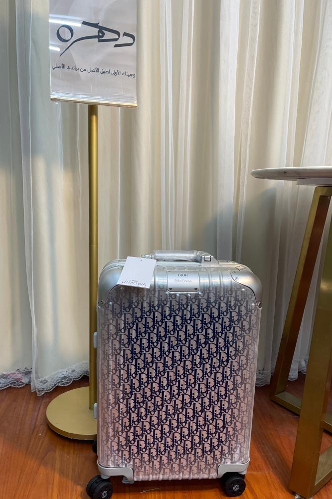 حقيبة سفر X RIMOWA من ديور - فضي وكحلي
