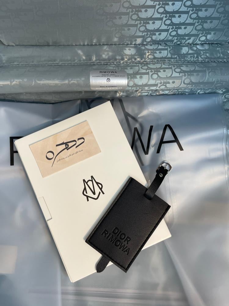 حقيبة سفر X RIMOWA من ديور - فضي وكحلي