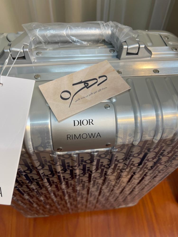 حقيبة سفر X RIMOWA من ديور - فضي وكحلي