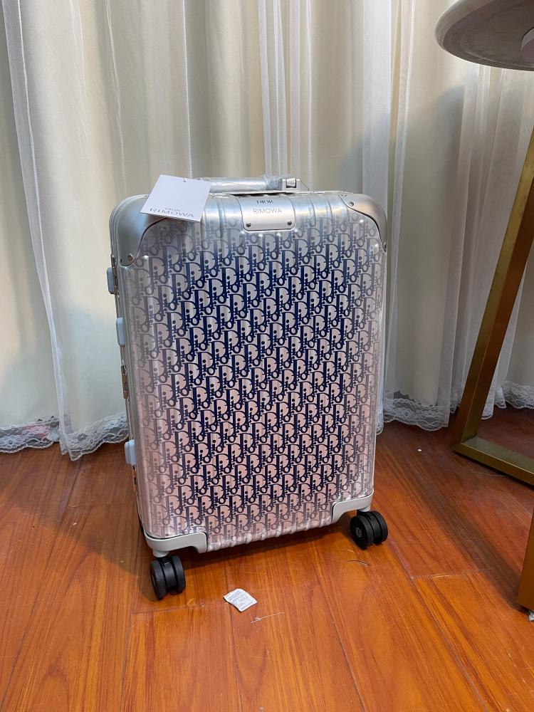 حقيبة سفر X RIMOWA من ديور - فضي وكحلي