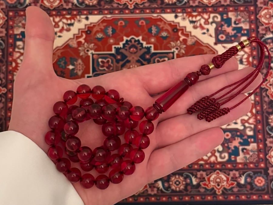 مسباح بكلايت أحمر شفاف