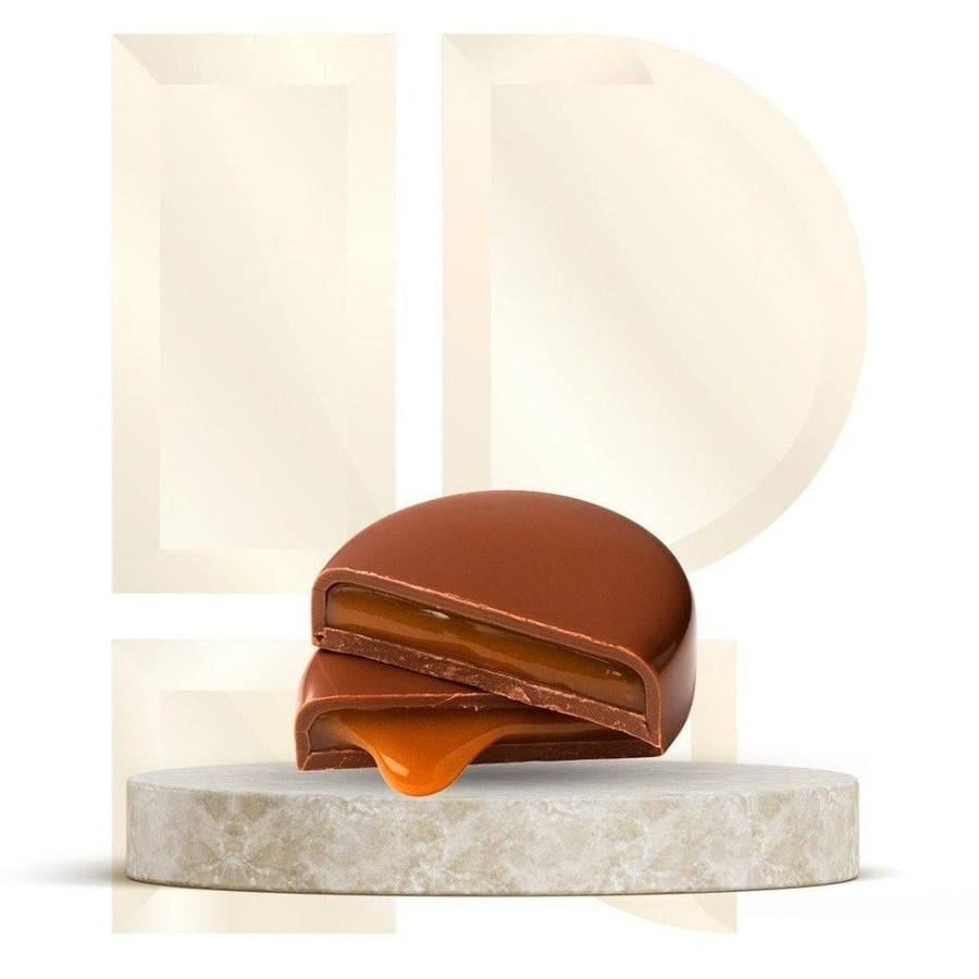 A kilogram of uncovered chocolate (cylindrical round shape)