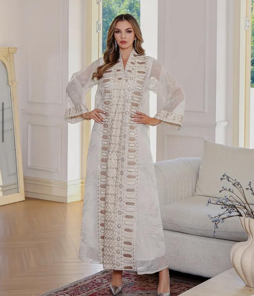Galabeya in the beige color, very with gold