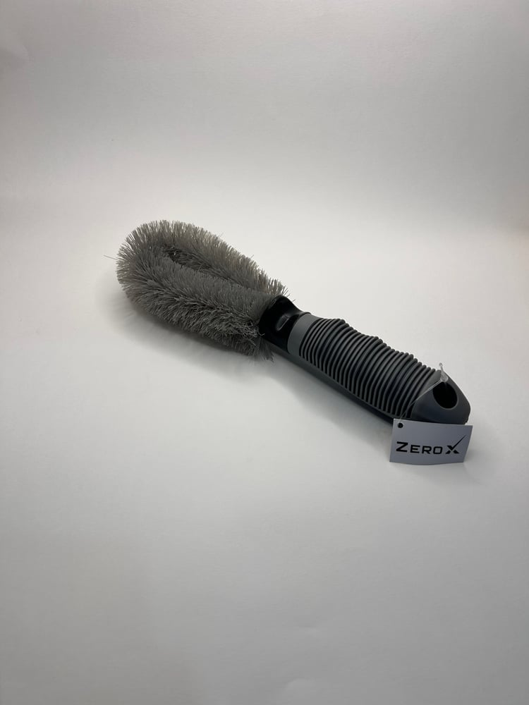 Tire rim cleaning brush