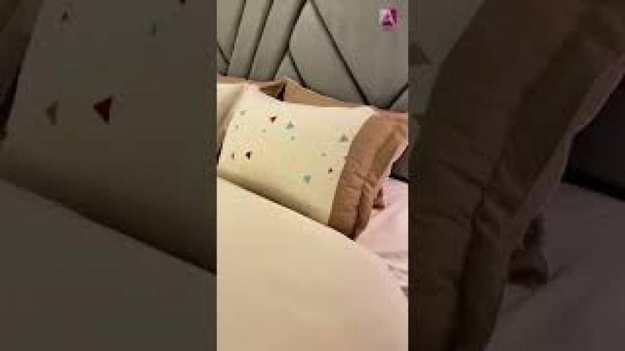 Brightly embroidered bedspreads