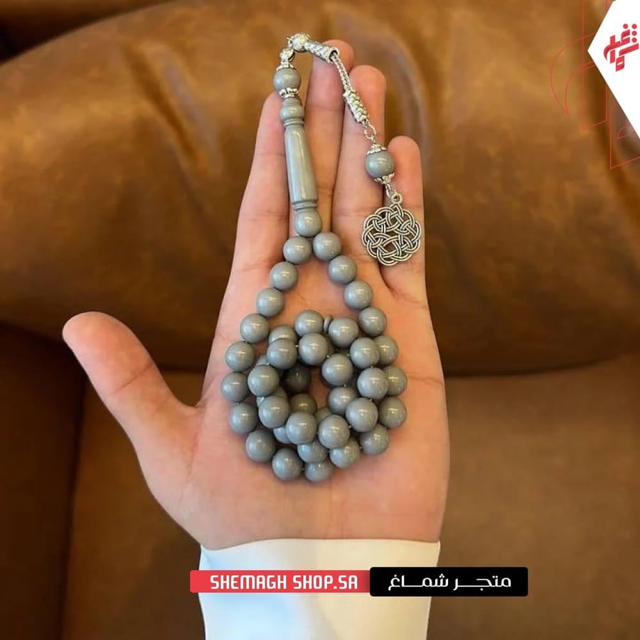 مسباح بكلايت اسمنتي مع كركوشة فضية أنيقة تبرز جمال الـ سبحه الرجاليه