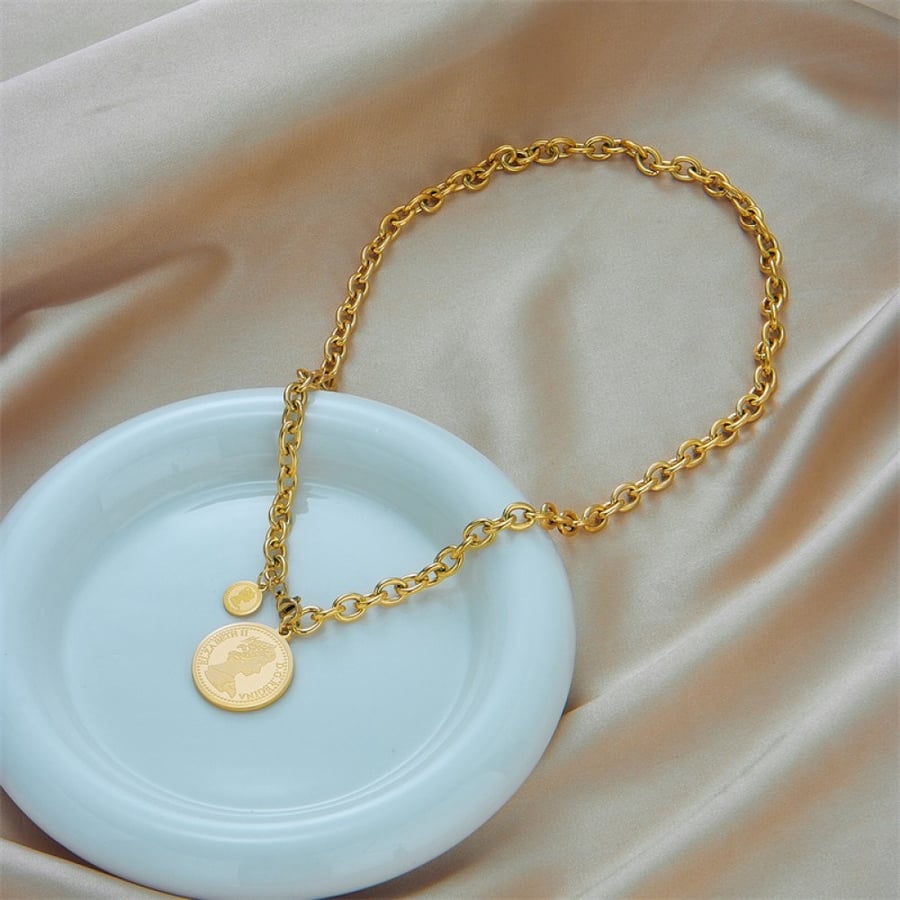 18 karat gold-plated necklace with a coin-shaped pendant