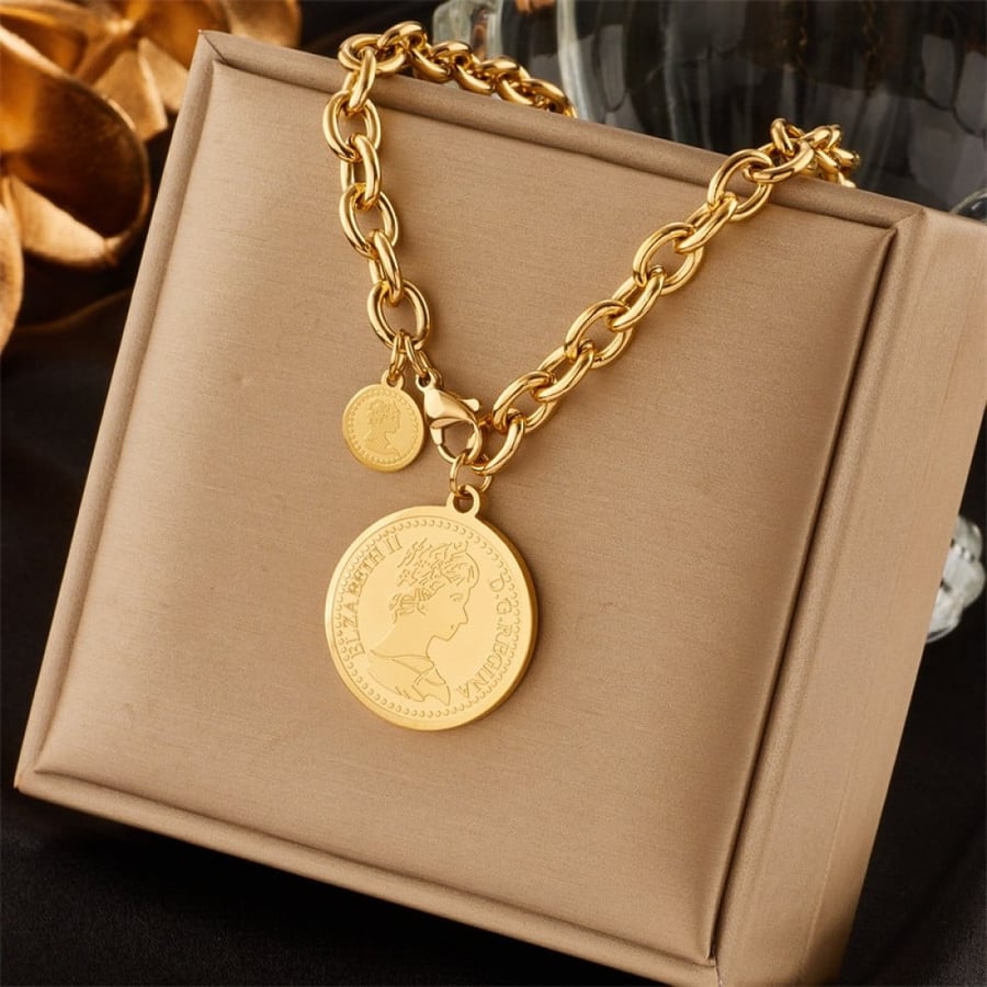 18 karat gold-plated necklace with a coin-shaped pendant