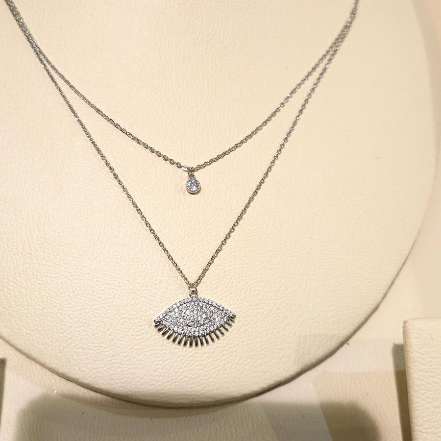 Silver eye chain decorated with stones