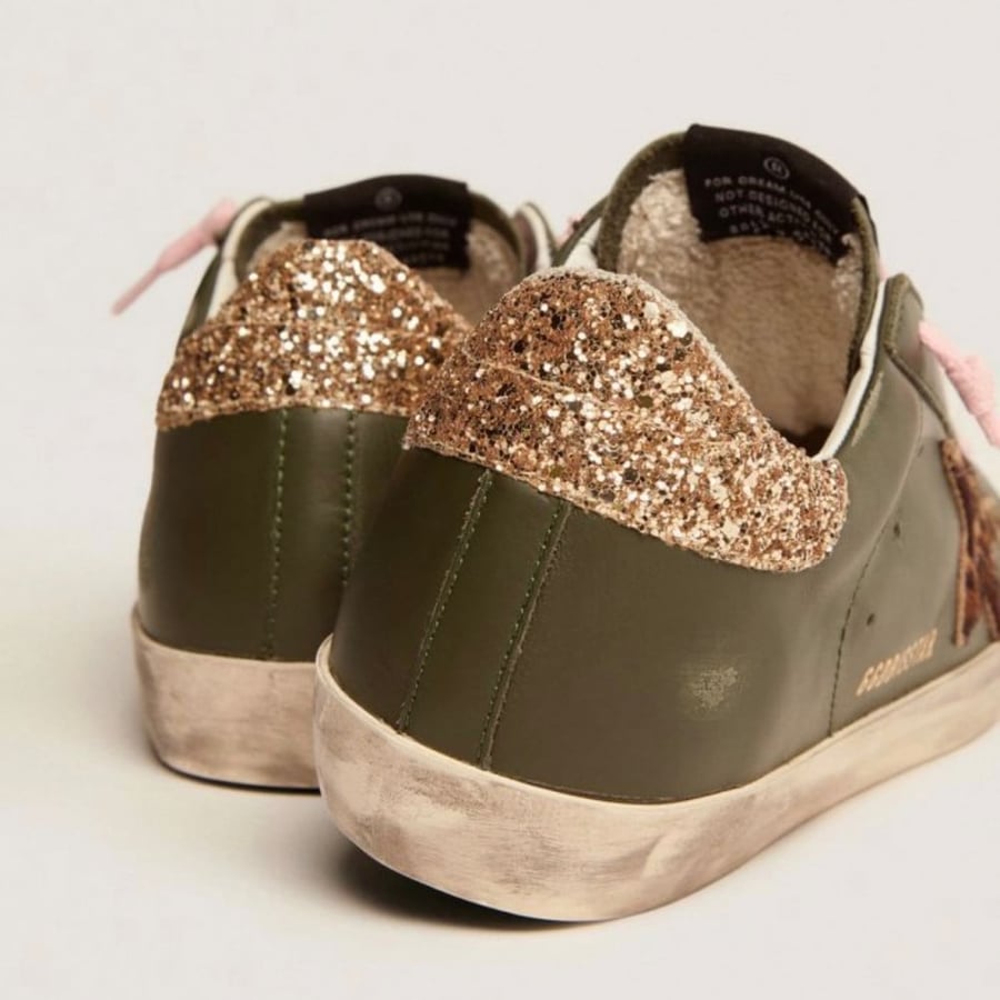 Golden Goose Super-Star sneakers in dark green leather with gold glitter heel tab