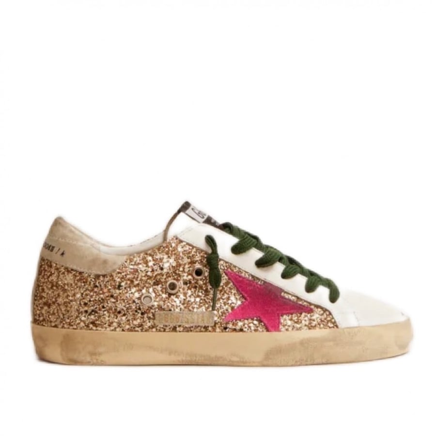 Super-Star sneakers in gold glitter with fluorescent pink suede star